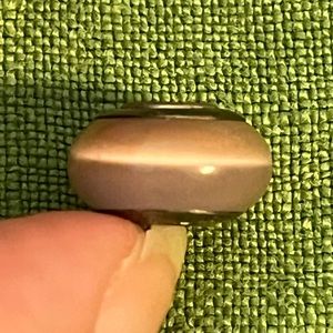 Pandora Murano glass charm in pink swirl pattern, 1/2” diameter, 1/4” thick